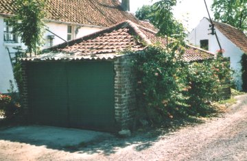 Foto van Rosmolen van de Van Massenhoeve, Westkerke (Oudenburg), Foto: Lieven Denewet | Database Belgische molens